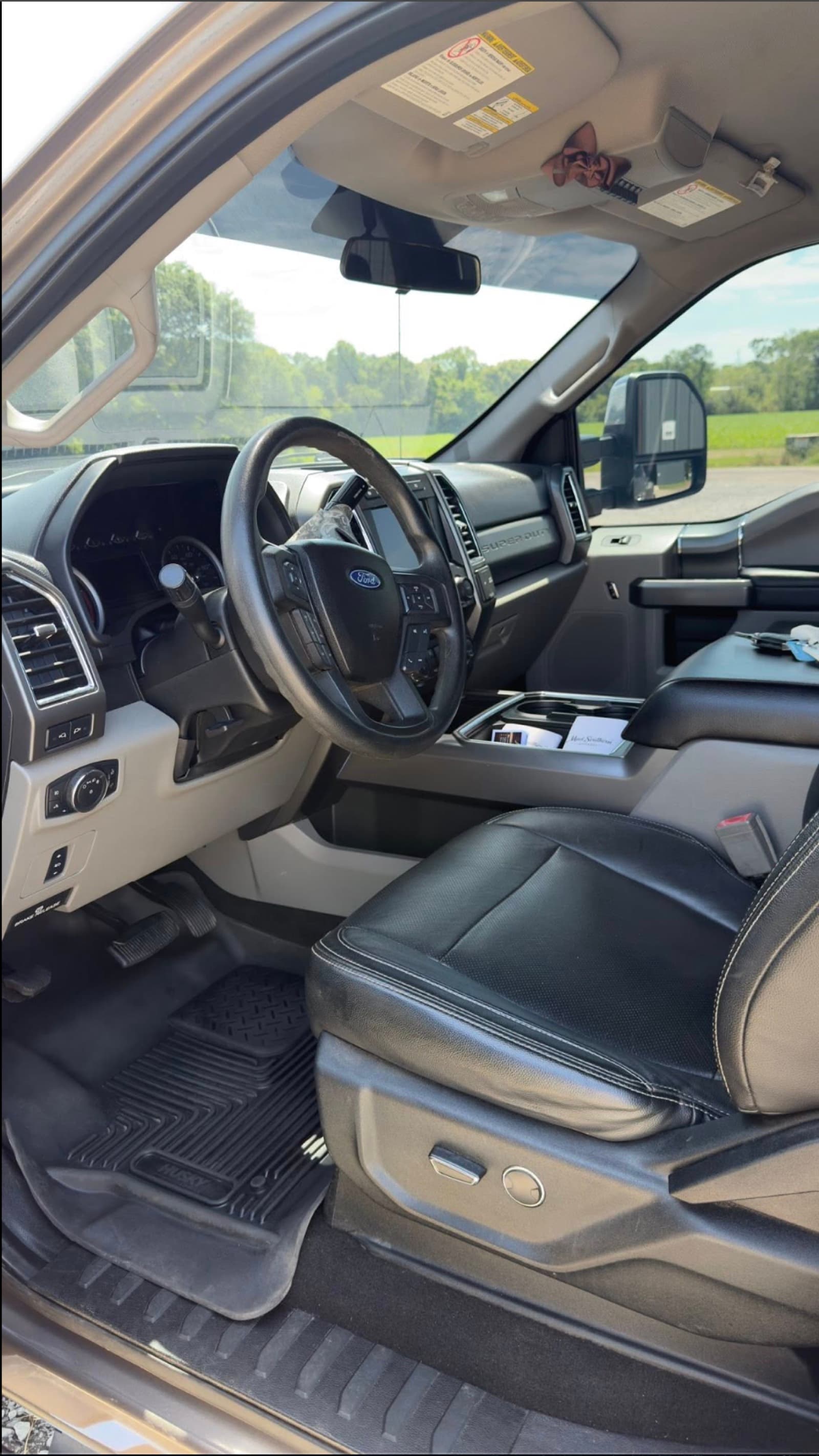 Cleaned black leather interior of a Ford F-150 after an interior deep clean in Leawood